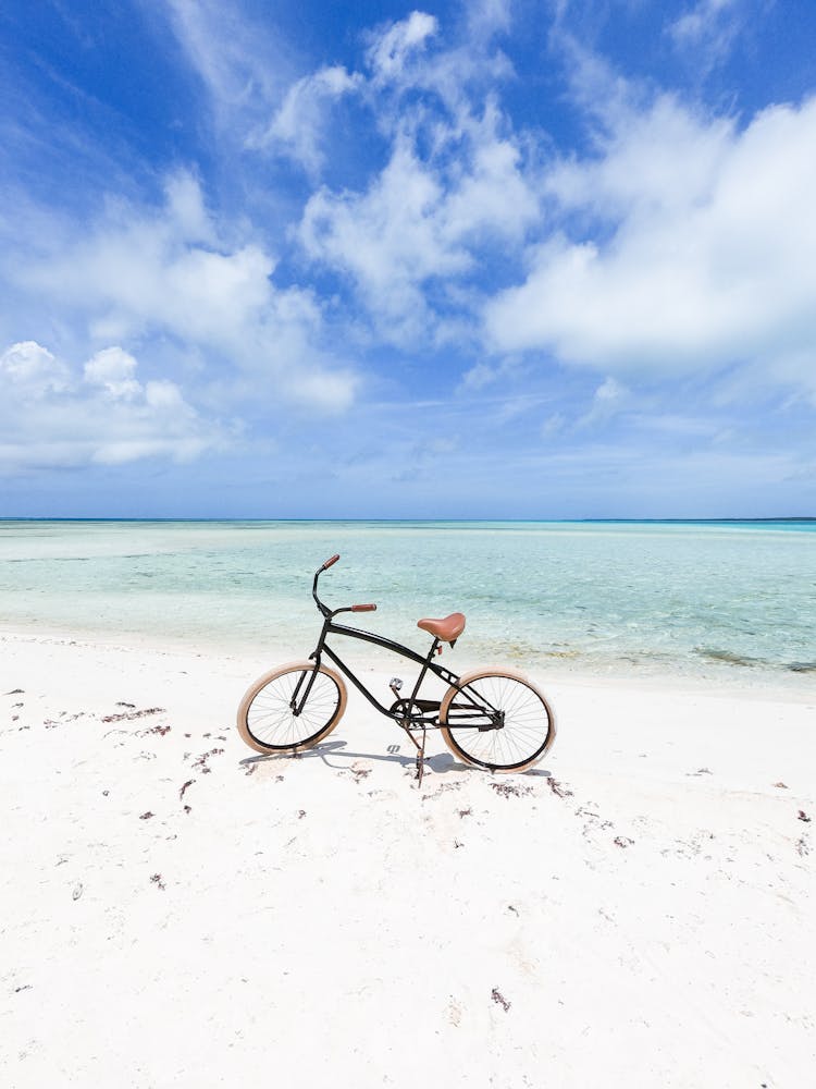 Photo Of A Bicycle On A Beach