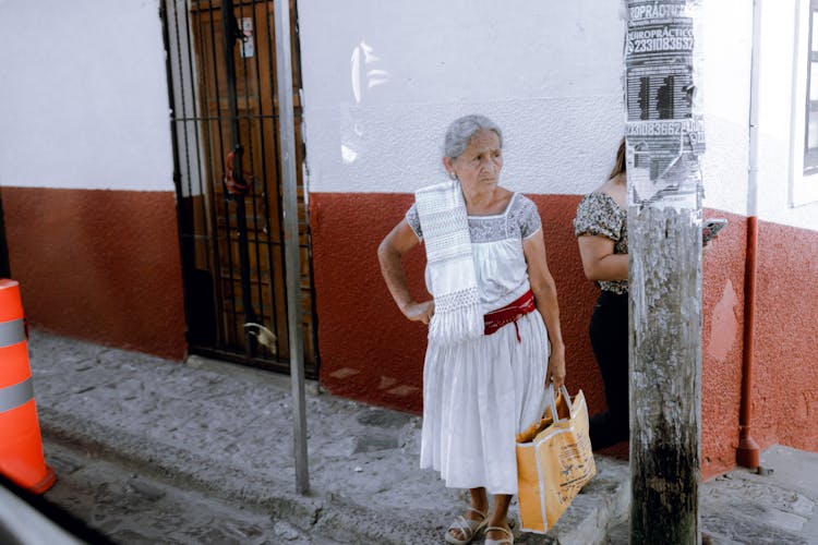 Lady Waiting On The Street