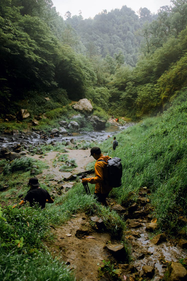 People Hiking In Mountains 