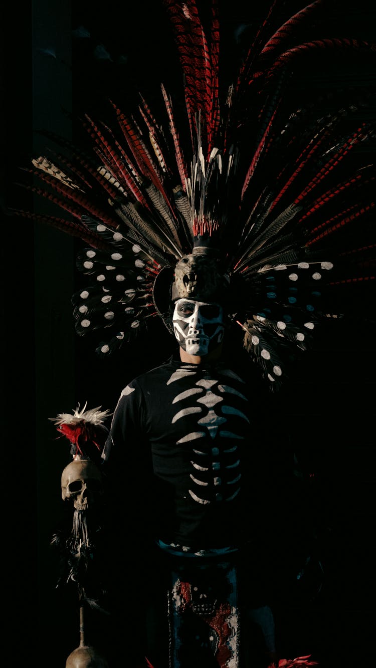 Skeleton With Feathers Crown And Skull