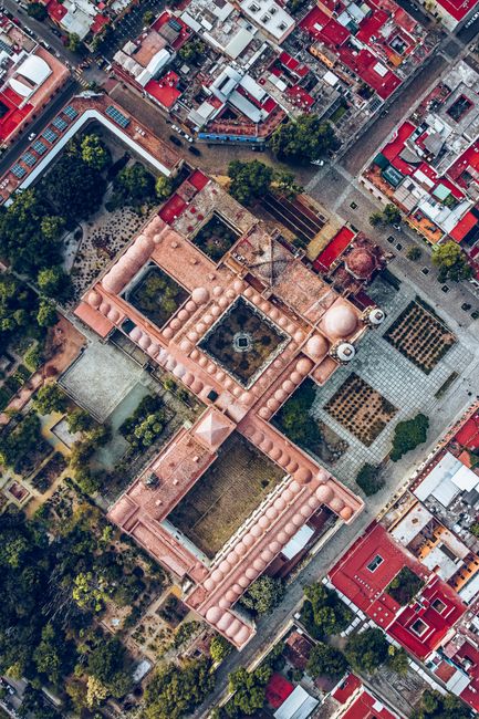 Stunning aerial view of Templo de Santo Domingo de Guzmán in Oaxaca, Mexico, showcasing intricate architecture.