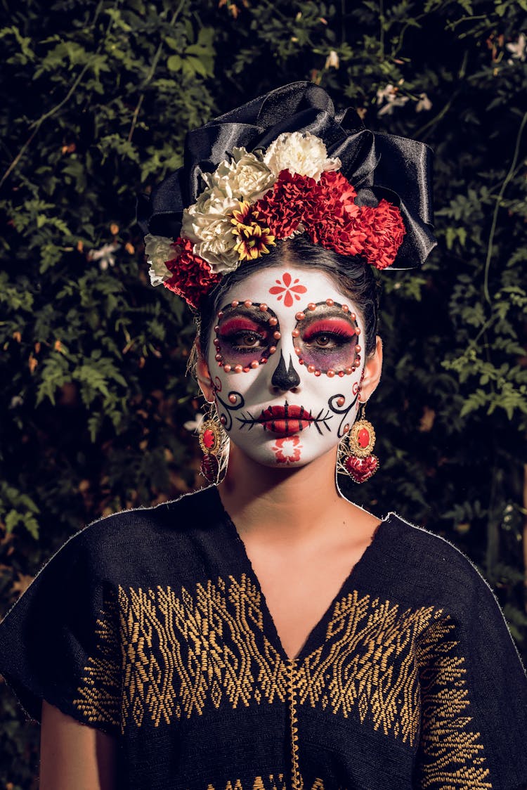 Portrait Of Woman Wearing Traditional Dia De Los Muertos Makeup