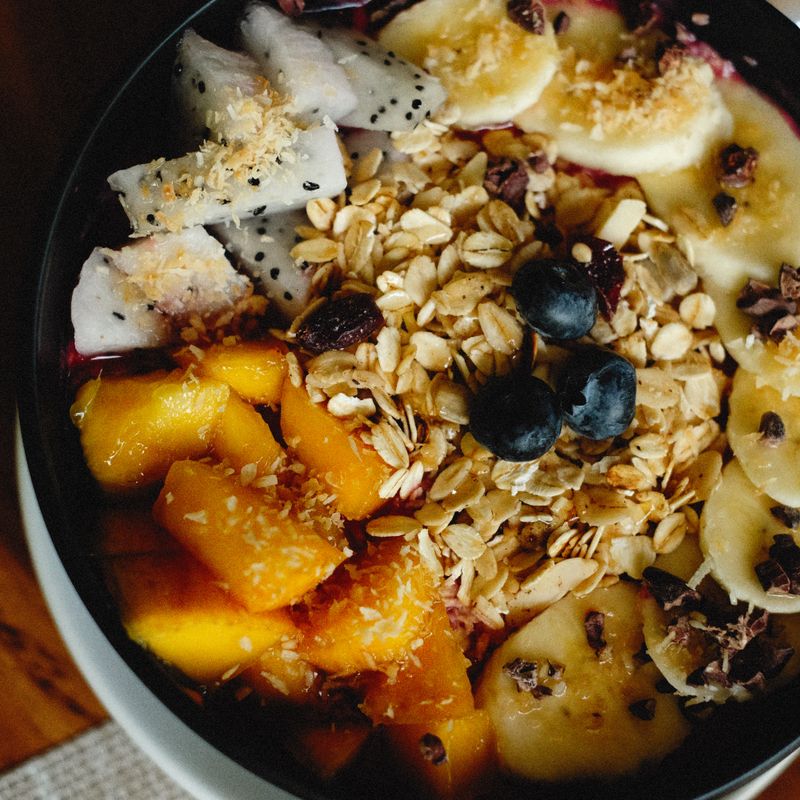 Thai Mango Sticky Rice Yogurt Bowl with Crispy Sesame Granola