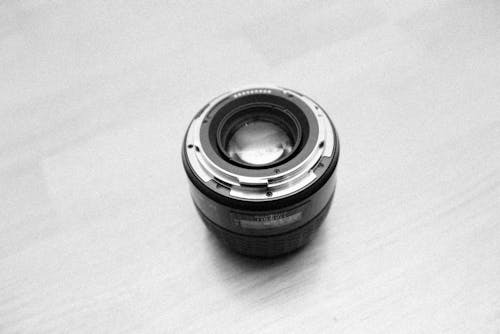 Grayscale Photo of a Camera Lens 