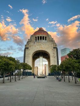 Monumento a la Revolución with vibrant sky in Mexico City, a symbol of history and architecture.