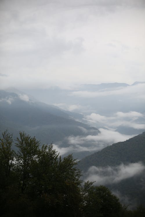 Aerial Photography of Cloudy Mountains