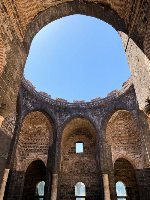 Free Interior view of the ancient St. George Church in Diyarbakir showcasing its impressive architectural features and historic stonework. Stock Photo