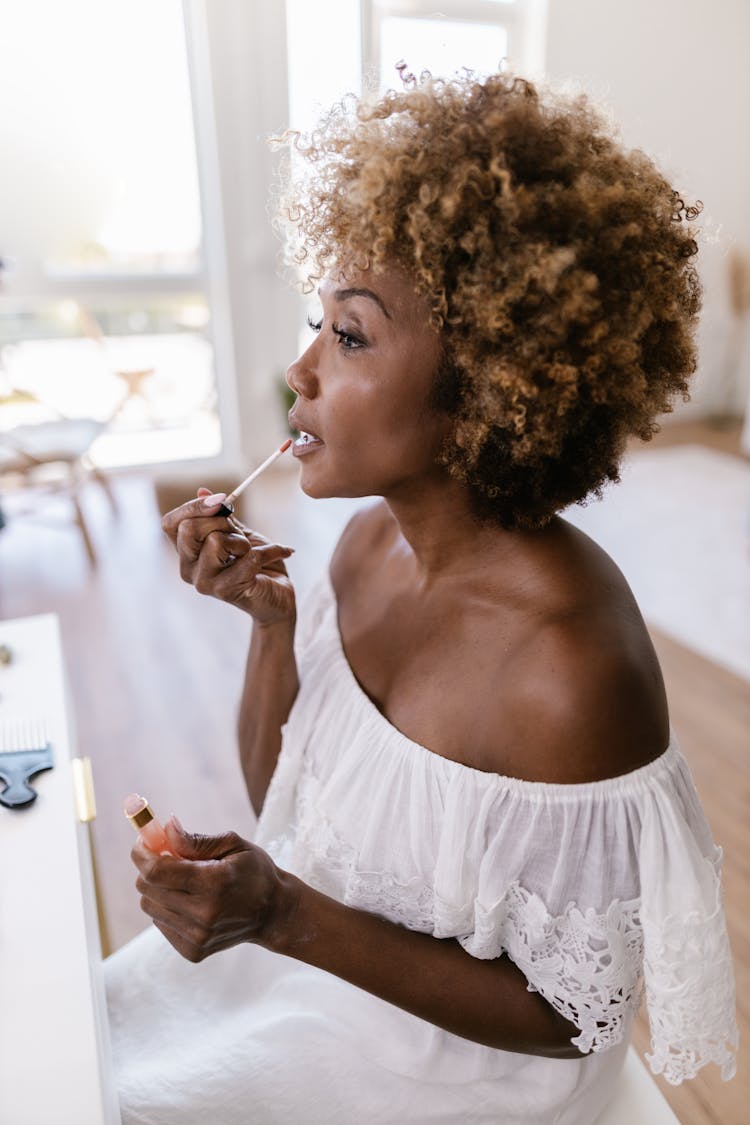 Woman Doing Makeup Putting Lipstick