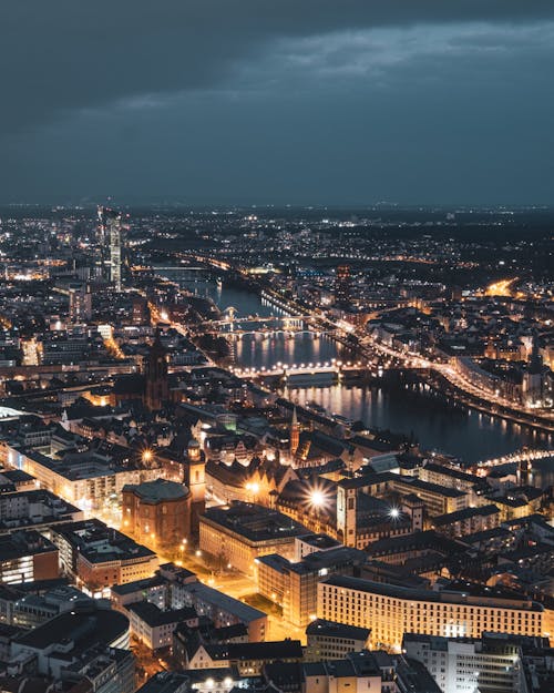 Aerial View of Illuminated Buildings during Night Time