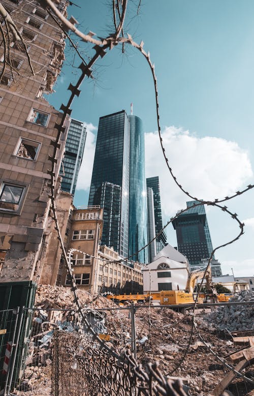 Skyscrapers Behind the Ruins of a Demolished Building
