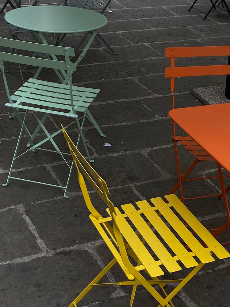 Colorful Tables And Chairs In Cafe Outdoors