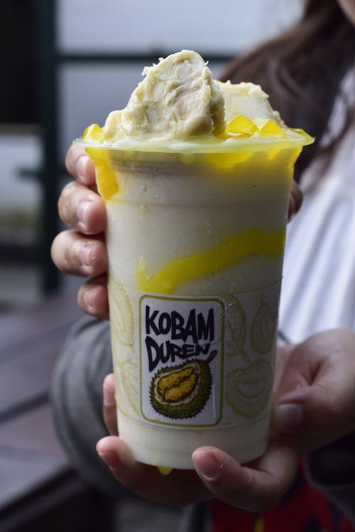 Free Durian Shake in a Plastic Cup Stock Photo