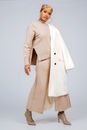 Beautiful Woman Wearing Fashion Clothing in Studio Shot