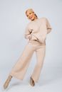 Beautiful Woman Wearing Fashion Clothing in Studio Shot