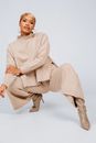 Beautiful Woman Wearing Fashion Clothing in Studio Shot
