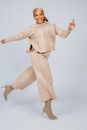 Beautiful Woman Wearing Fashion Clothing in Studio Shot