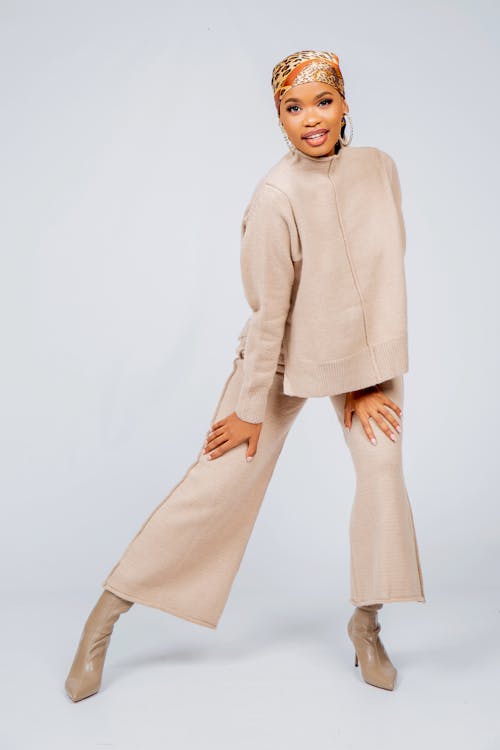 Beautiful Woman Wearing Fashion Clothing in Studio Shot