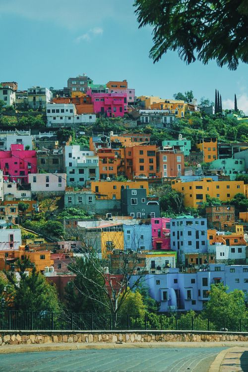 Free Vibrant multicolored hillside houses in Guanajuato, Mexico, showcasing unique urban landscape. Stock Photo