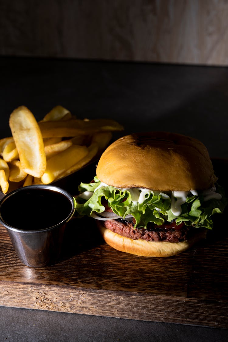 Close-Up Shot Of Burger And Fries 