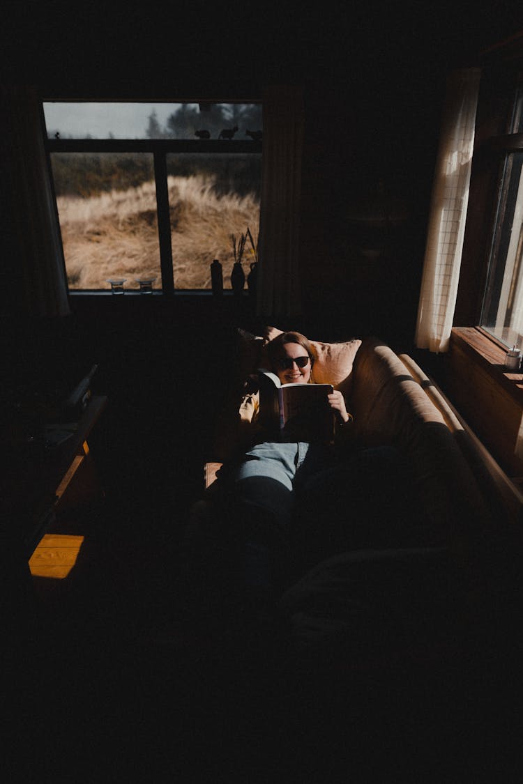 Woman Lying On A Couch