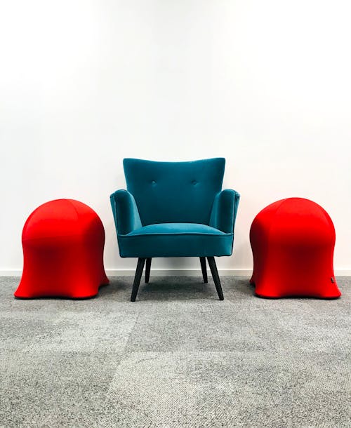 A Blue Armchair on the Carpet