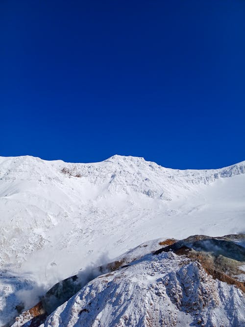 Fotos de stock gratuitas de cielo azul, cubierto de nieve, fotografía de naturaleza