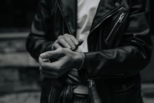 Free Grayscale Photo of a Person with a Bracelet Stock Photo
