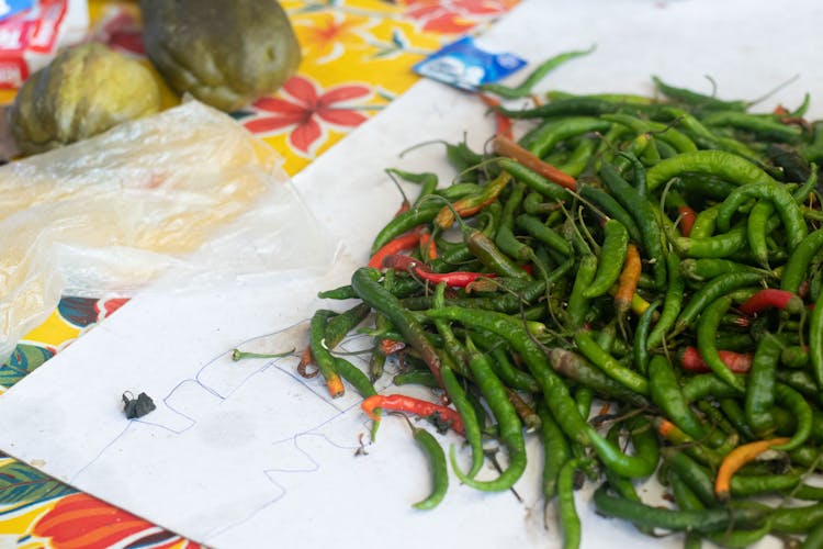 Green Chili On White Paper