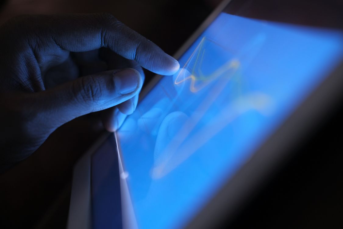 Close up of a Person Using a Tablet · Free Stock Photo