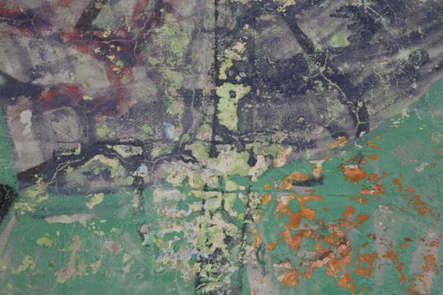 Free Close-up of a textured wall with colorful peeling paint, creating an abstract pattern. Stock Photo