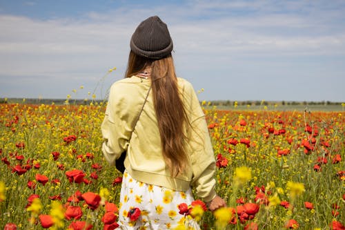 A Woman Standing in a Field