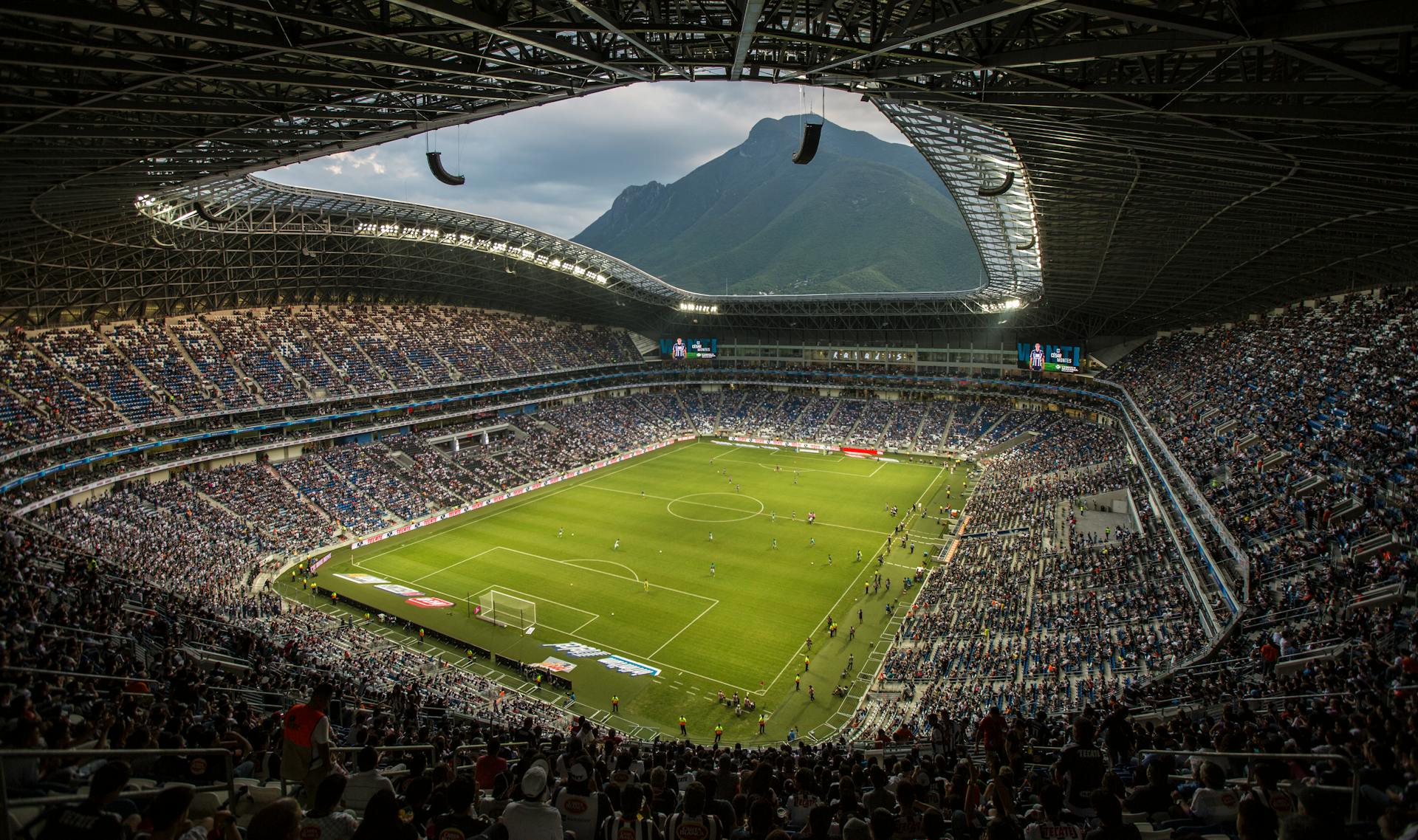 People Inside a Football Stadium