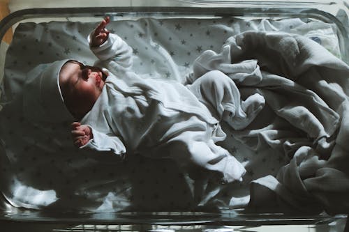 Free Overhead Shot of a Newborn Baby Stock Photo