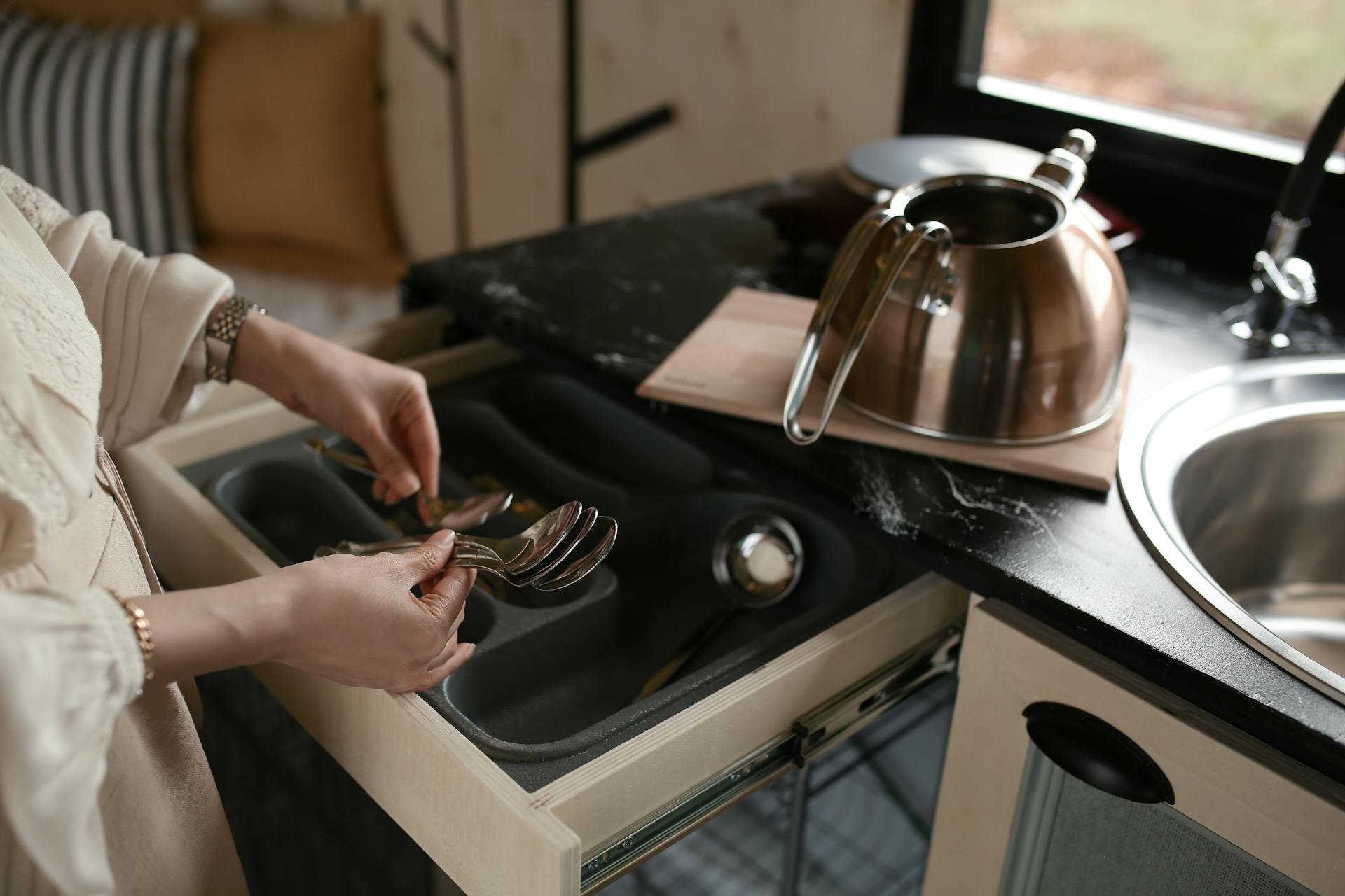 Kitchen Table with Drawer for Utensils and Built in Sink in Mobile Home