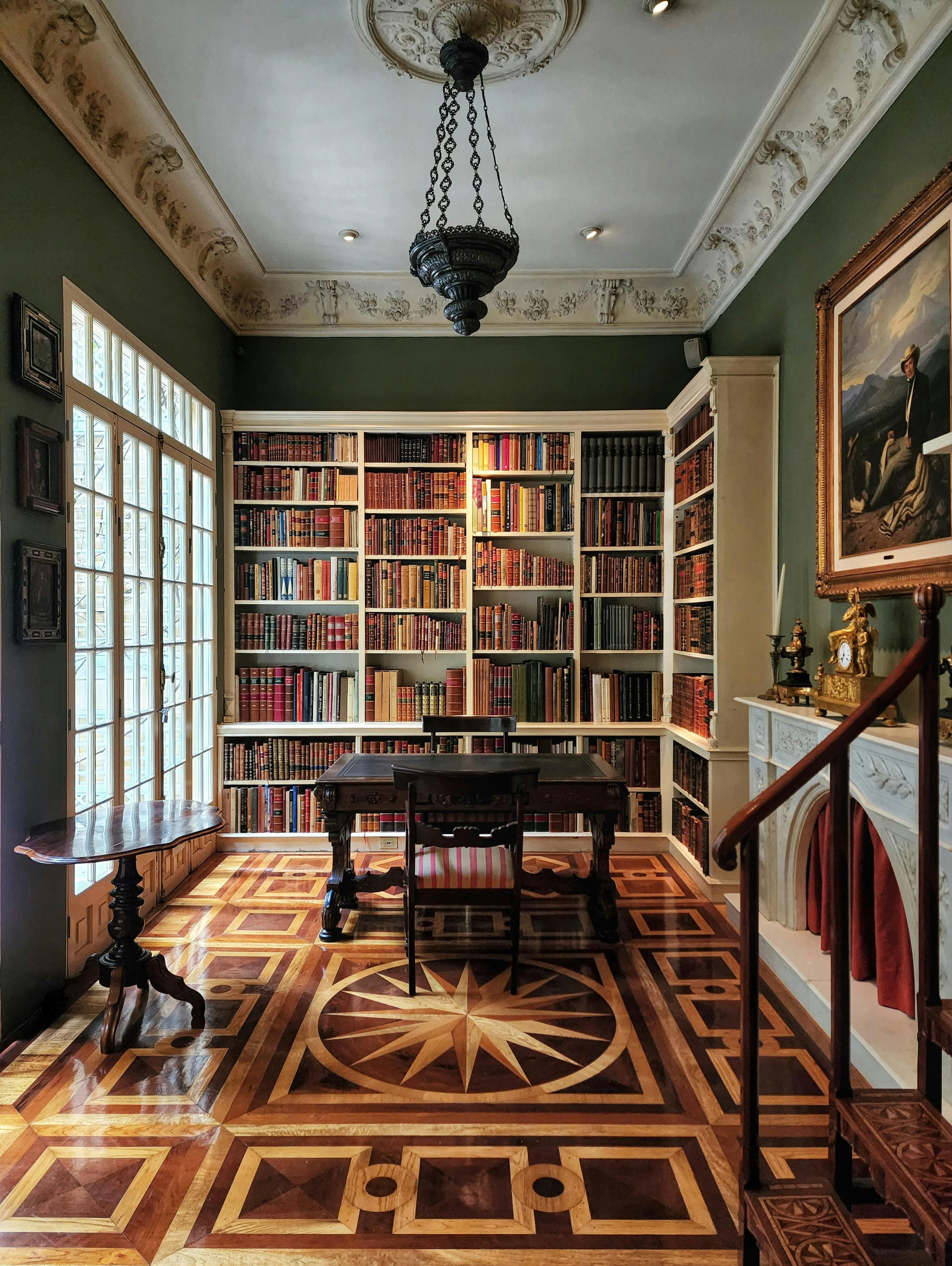 Traditional library with classic wood shelving and warm lighting