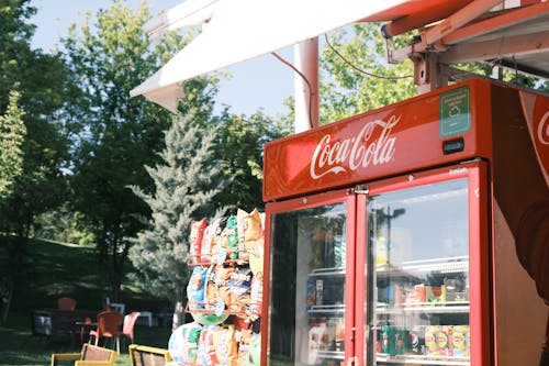 Foto profissional grátis de Coca Cola, comércio, display