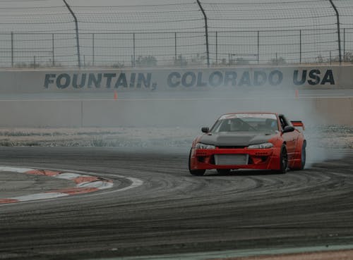 Foto profissional grátis de automobilismo, automóvel, carro de corrida