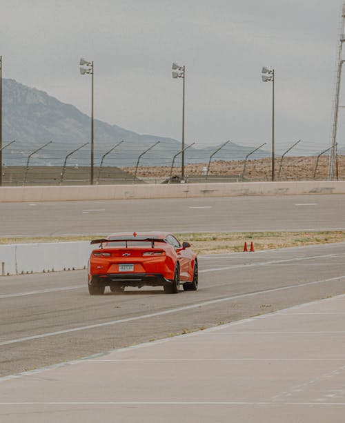 A Red Sports Car on the Road