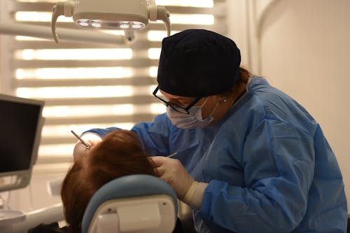 Foto profissional grátis de clínica, dentista, doutor