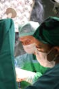Surgeon performing plastic surgery