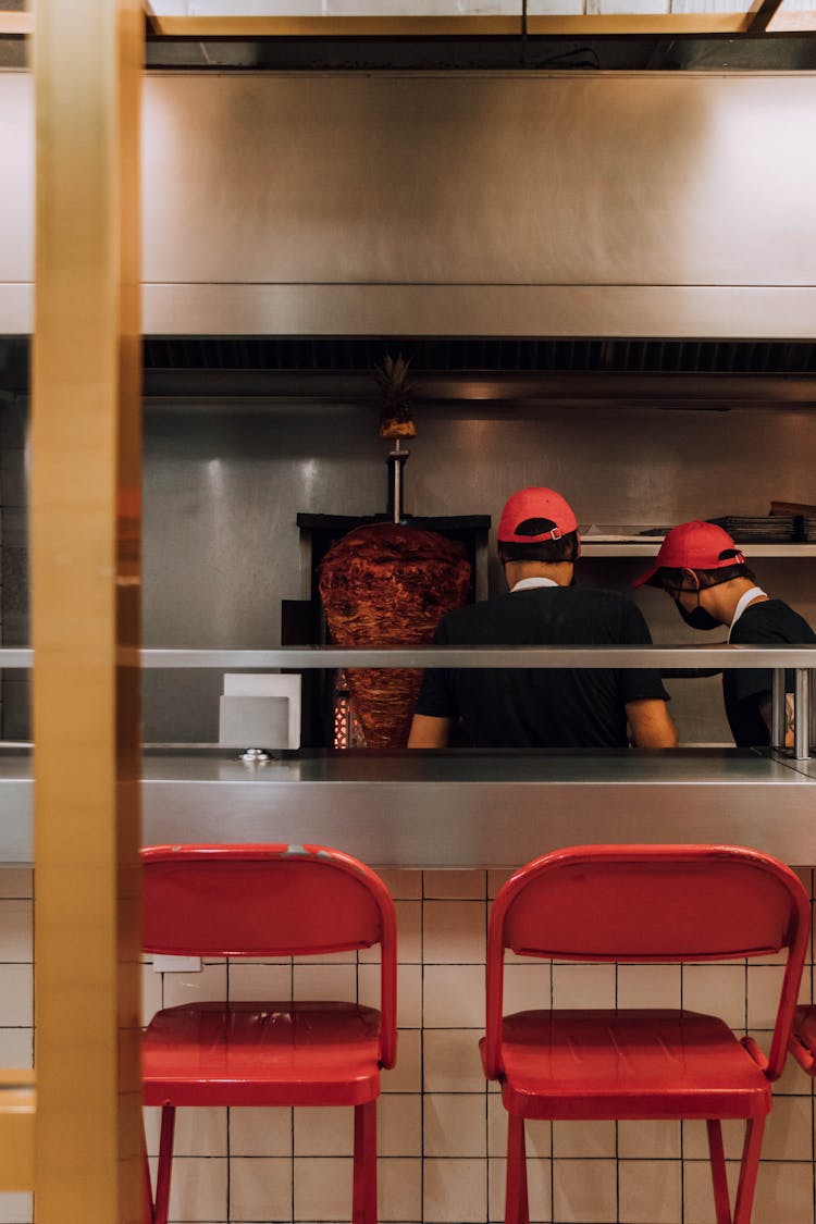 Men Working In A Kebab Restaurant 