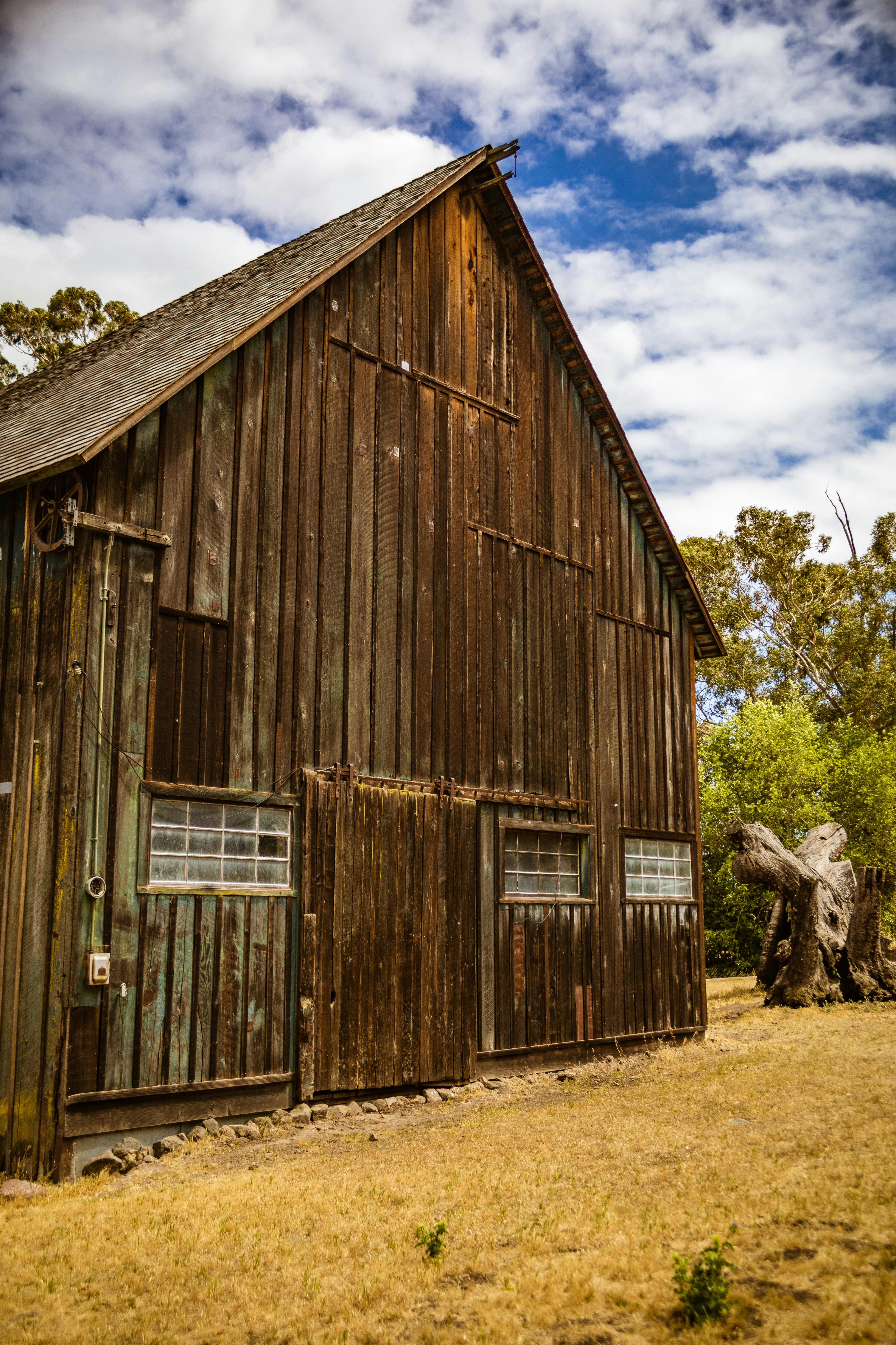 How do you anchor a wood shed to the ground?