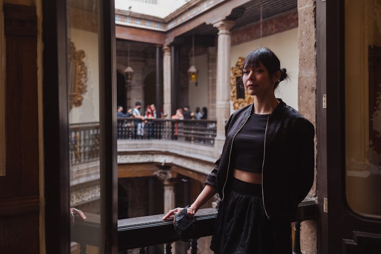 Young Woman Posing In Historical Building 