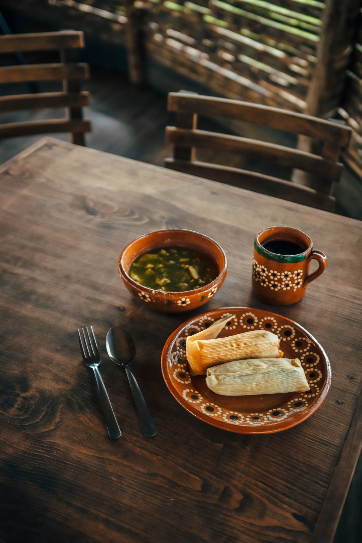 Tamales served in corn husks