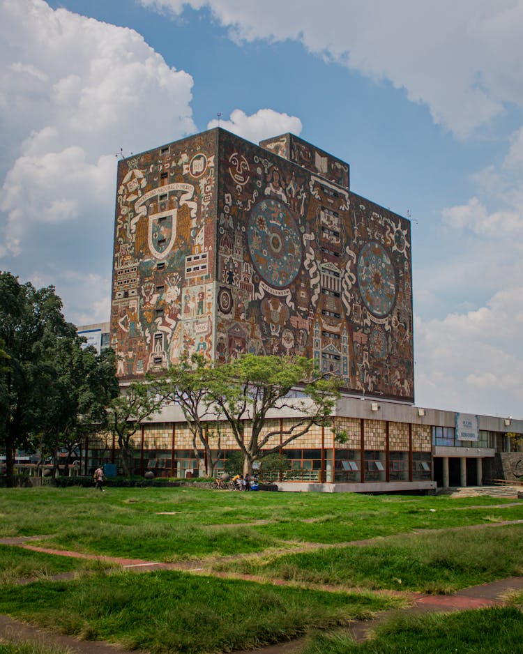 Clouds Over Building With Mural