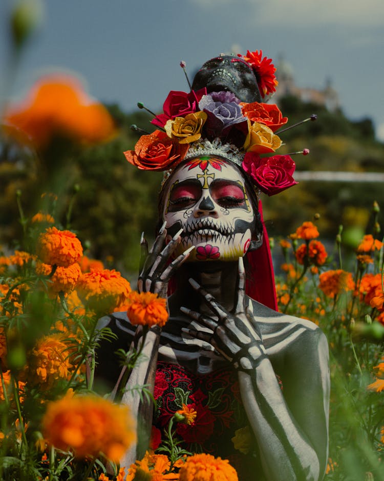 Person In Skeleton Costume And Flowers Wreath