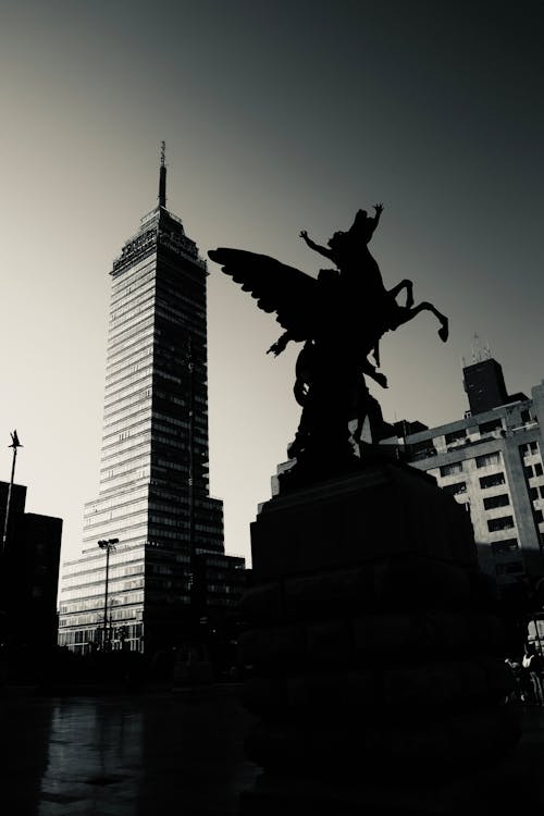 Grayscale Photo of City Buildings