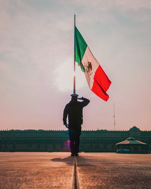 Man Saluting Flag of Mexico