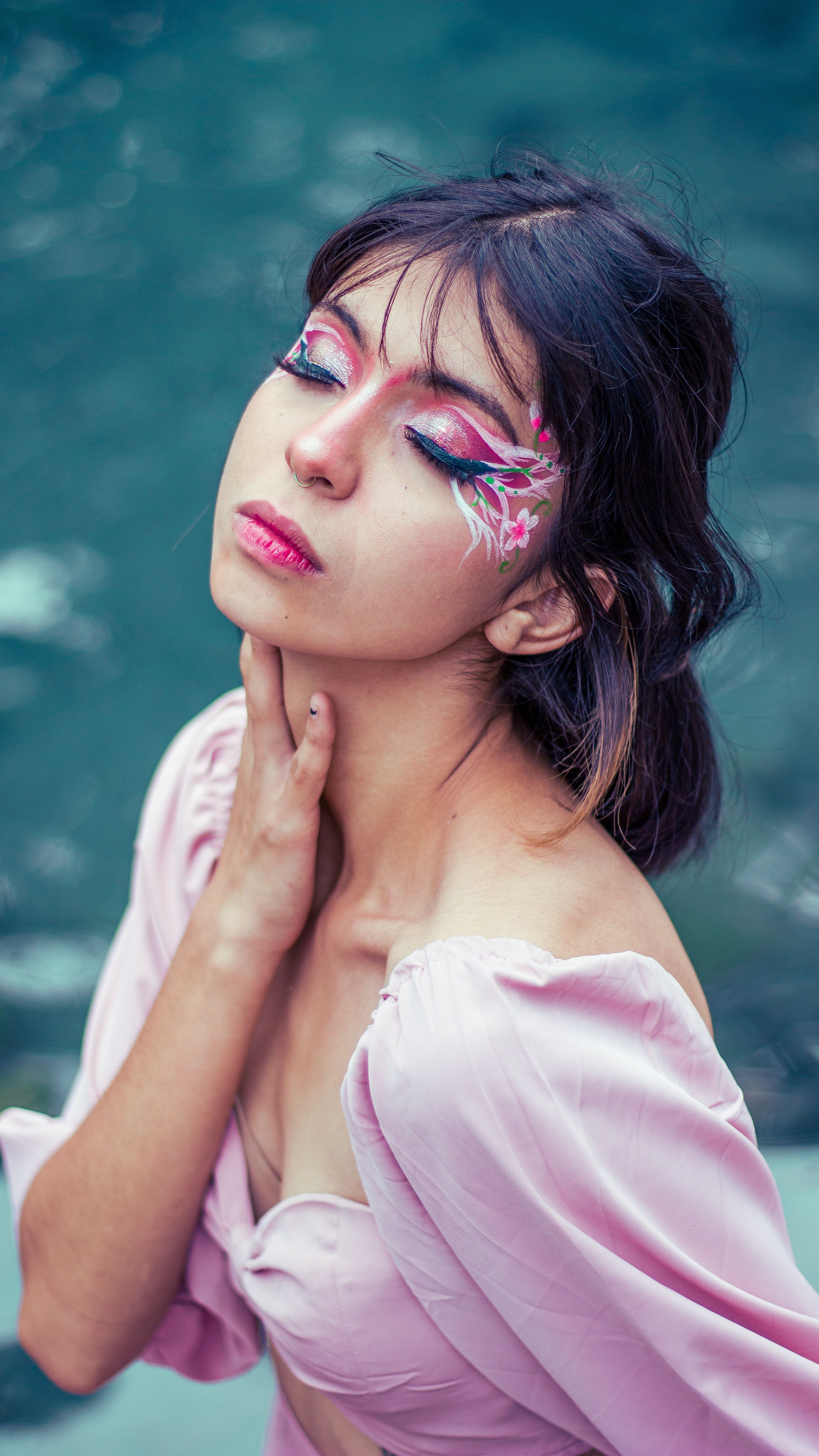 Pretty Woman Holding Her Neck · Free Stock Photo