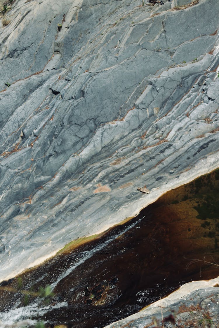 River By Eroded Rock Formation